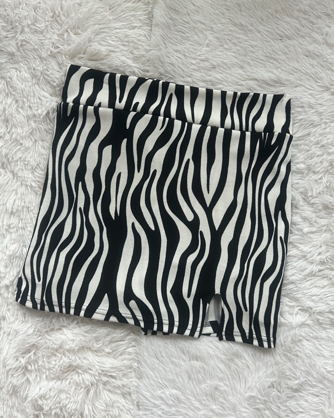 Falda CON short cebra blanco